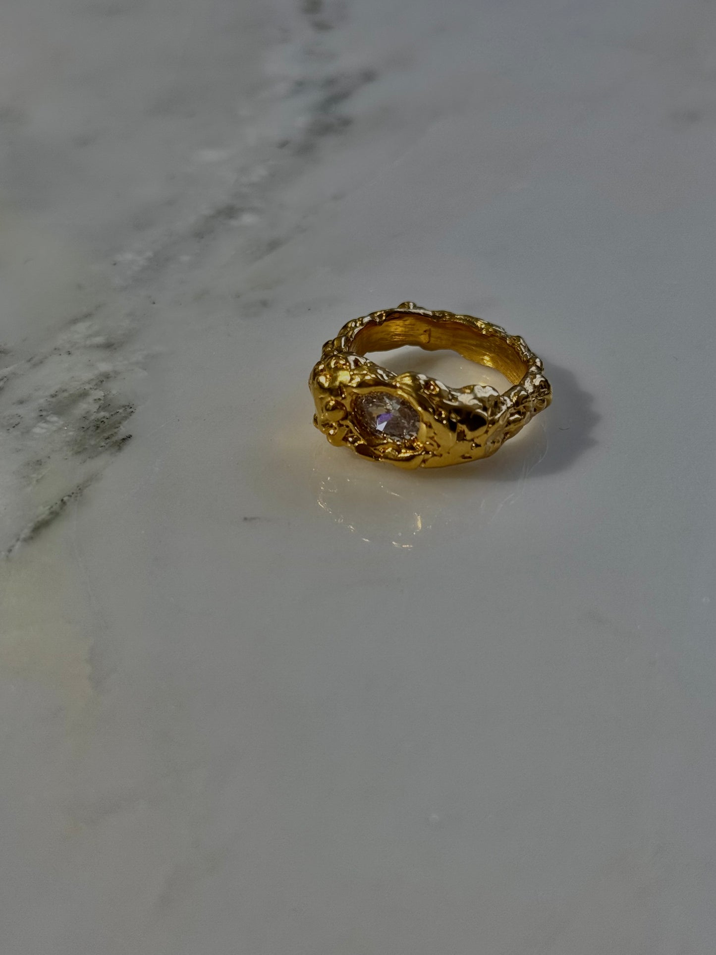 Raw zircon ring - a symbol of light and wisdom